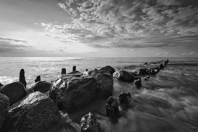 Scenic view of sea against sky during sunset