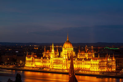 Illuminated city lit up at night