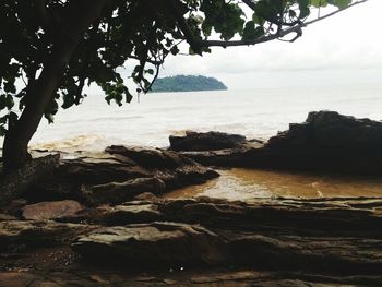 Scenic view of sea against sky at sunset