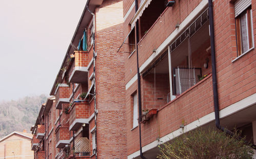 Low angle view of residential building against sky