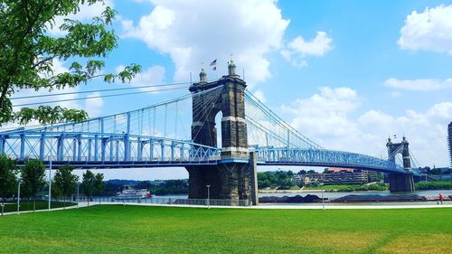 View of bridge against cloudy sky