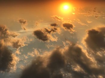 Low angle view of clouds in sky during sunset