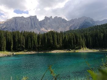 Scenic view of mountains and sea against sky