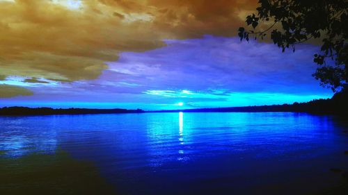 Scenic view of sea against sky at sunset