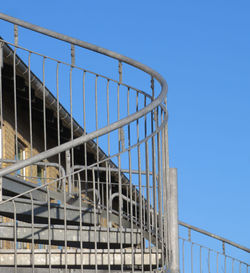 Low angle view of metallic structure against clear sky