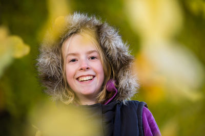 Portrait of smiling woman outdoors