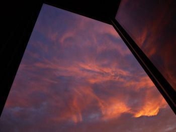 Low angle view of sky seen through window