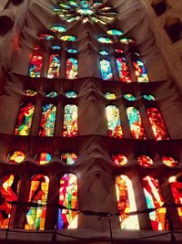 Low angle view of stained glass window in temple