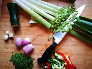 High angle view of chopped vegetables on cutting board