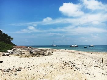 Scenic view of beach against sky