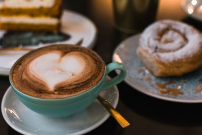 Coffee and pastries on a pub terrace. close up image