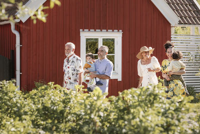 Three generation family walking together