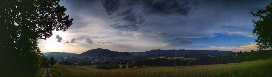 Panoramic view of landscape against sky during sunset