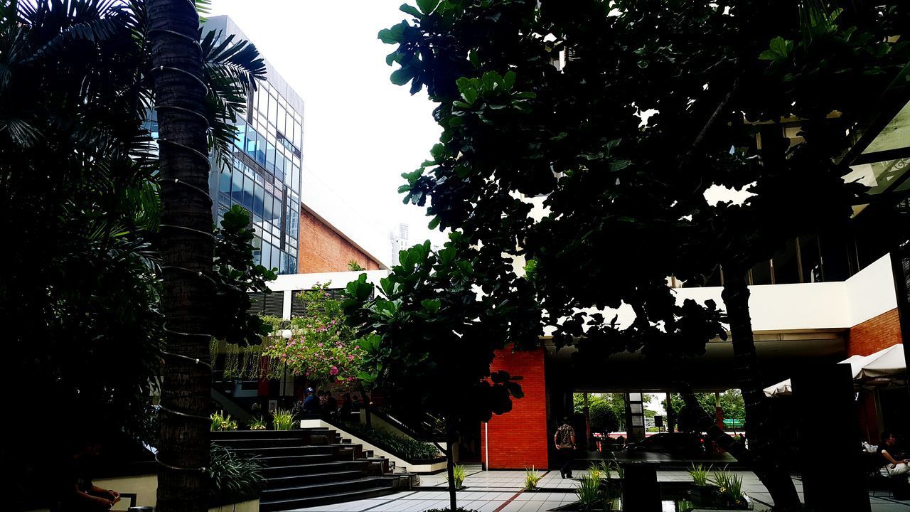 LOW ANGLE VIEW OF BUILDINGS AGAINST CLEAR SKY