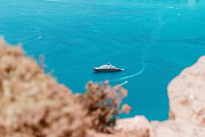 High angle view of boat sailing on sea