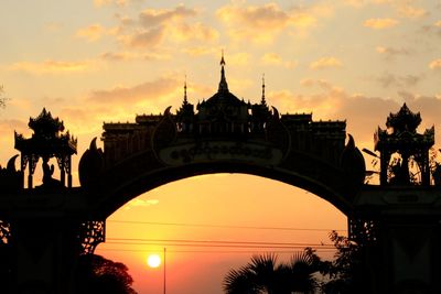 Silhouette of city during sunset