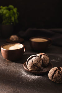 Chocolate cookies and cups of coffee