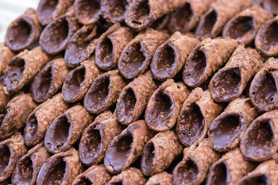 Close-up of stacked snack made with chocolate