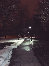 Road against sky at night