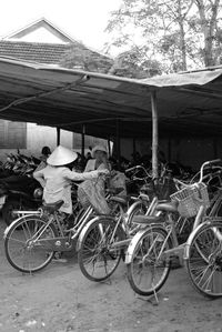 Bicycles parked against building