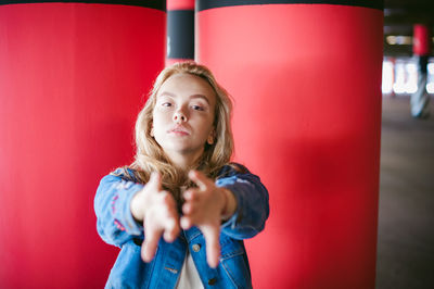 Portrait of woman standing in basement