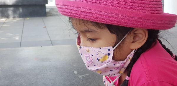 Cute girl in pink hat