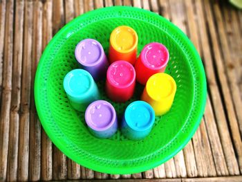 High angle view of multi colored candies on table