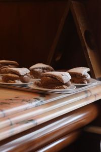 Close-up of dessert served on wooden table