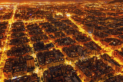 View of the residential areas of barcelona at night. city from a bird eye view