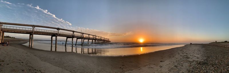 Panoramic view of sea against sky during sunset
