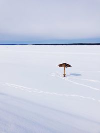 Full length of snow on land during winter against sky