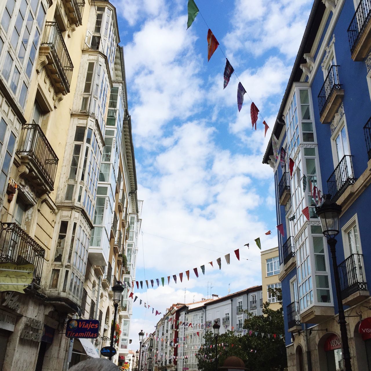 architecture, building exterior, built structure, low angle view, sky, city, cloud - sky, building, cloudy, cloud, city life, capital cities, residential building, day, tower, tall - high, travel destinations, outdoors, residential structure, skyscraper