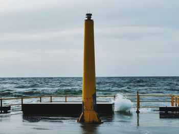 Pier on sea against sky