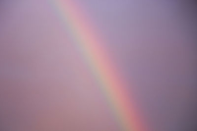 Low angle view of rainbow in sky