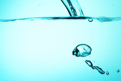 Close-up of bubbles over swimming pool