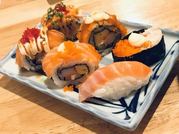 Close-up of sushi served on table