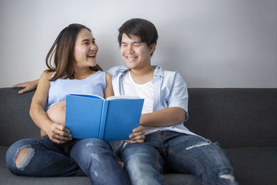 Portrait of a smiling young couple