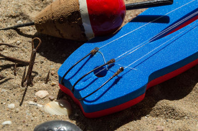 High angle view of ropes on sand