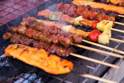 Close-up of meat on barbecue grill