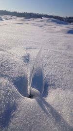 Scenic view of sea against sky during winter