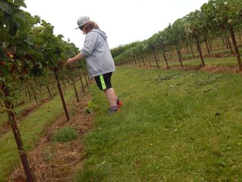 Full length of woman standing on grass