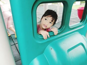 Portrait of cute girl sitting