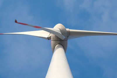 Low angle view of wind turbine against sky