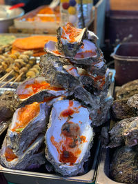 High angle view of fish on barbecue grill