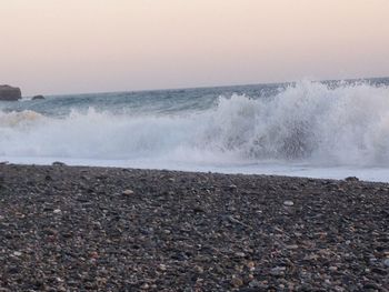 Waves splashing on rocks