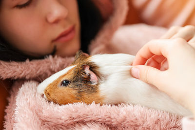 Close-up of woman with dog