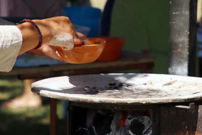 Close-up of hand holding ice cream