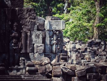 Old temple against stone wall