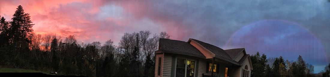 Low angle view of buildings against sky at night