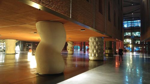 Illuminated corridor of building